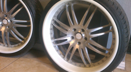 ken-yon brought the set of Savana came in forged wheels need a custom make over and need to be converted from  a bmw wheel to mercedes they had sine curb rash and looked dull so we gave them the rimspec treatment