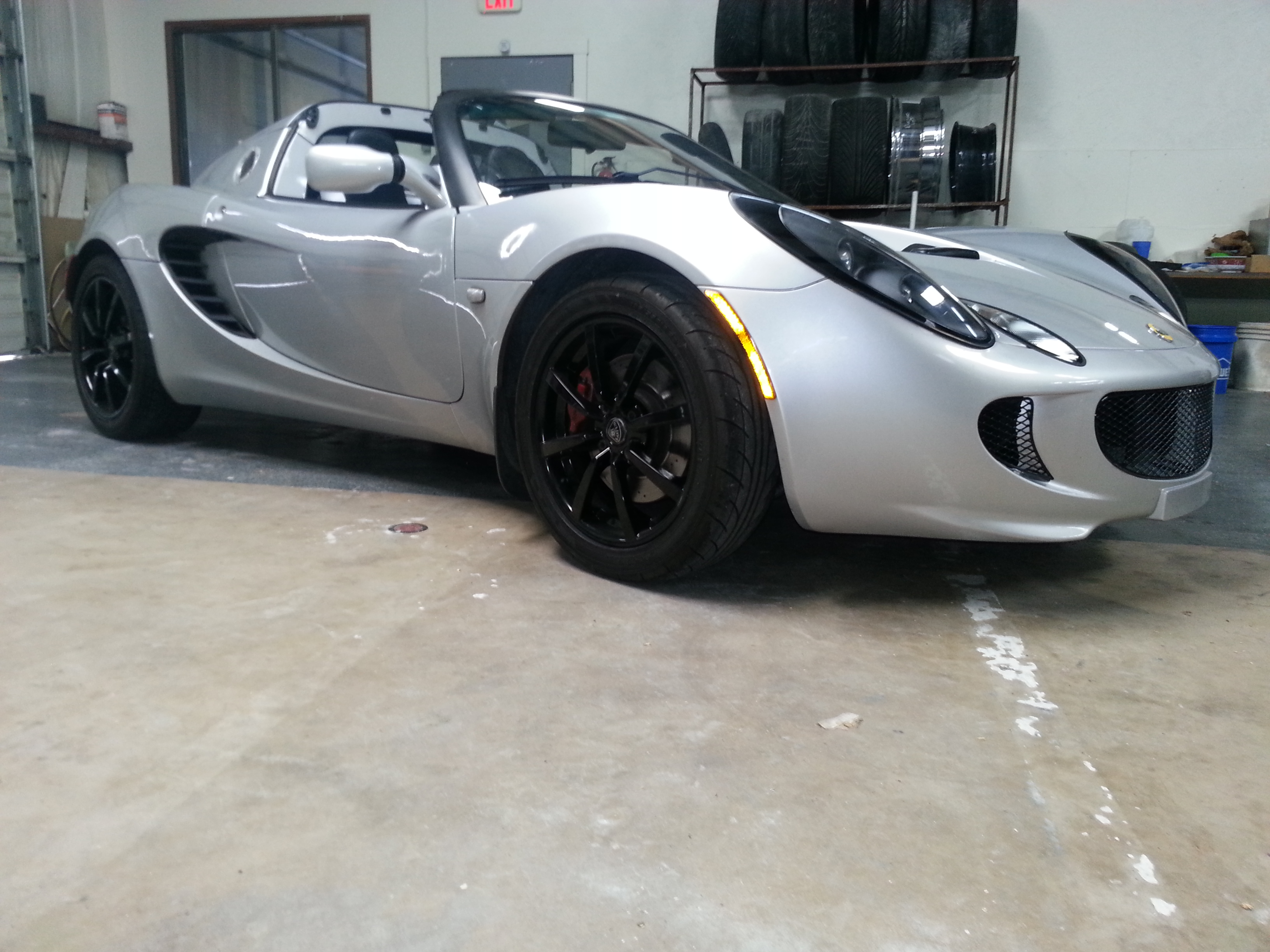 David Came In and wanted his Lotus To have a more custom look so we repaired and powdercoated his rims with a High Gloss black Here the final Product